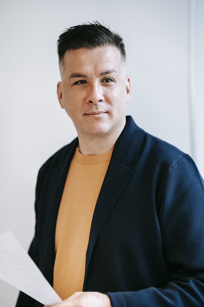 Photo Of Man Wearing Blue Blazer